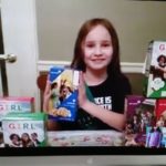 St. John's Academy Girl Scout donates cookies to First Responders