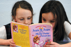 SJA Students reading at aftercare
